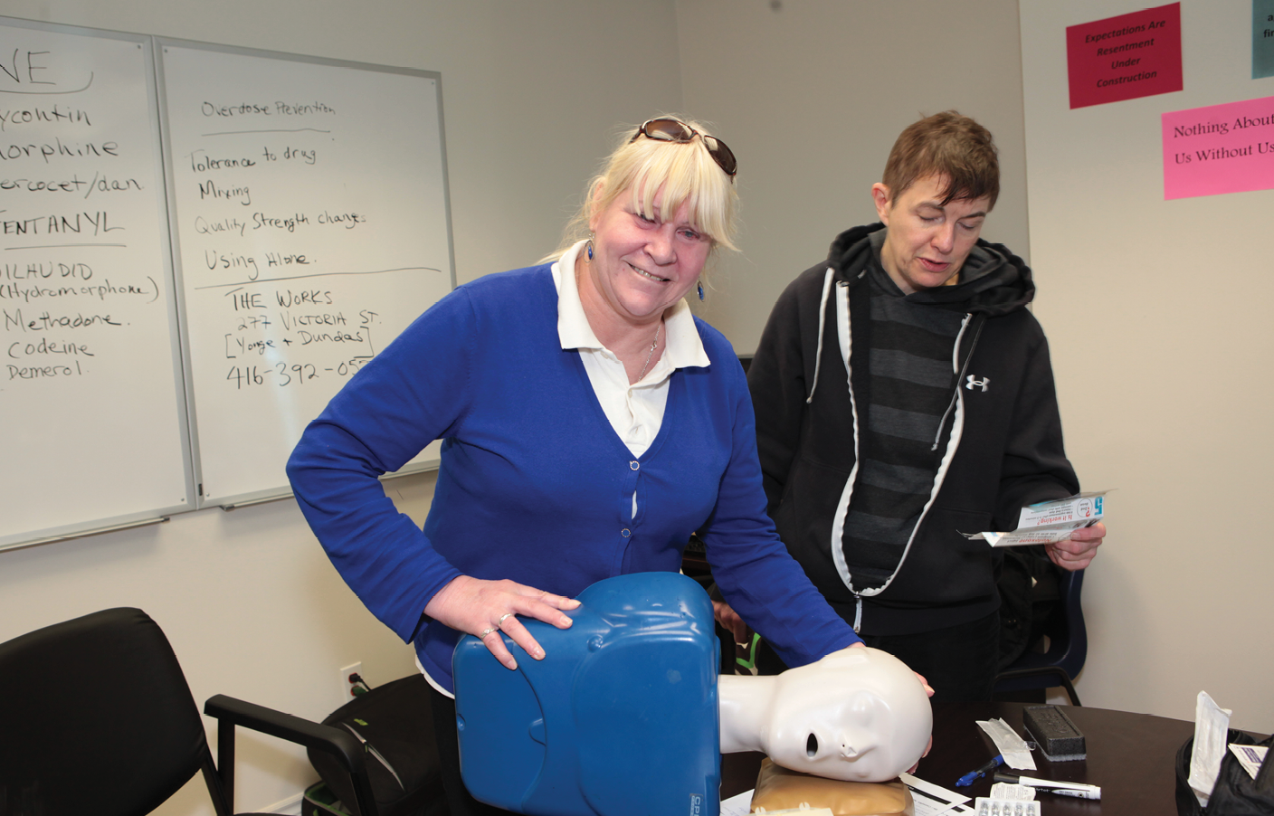 woman learning CPR