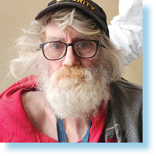 older man sitting in a chair