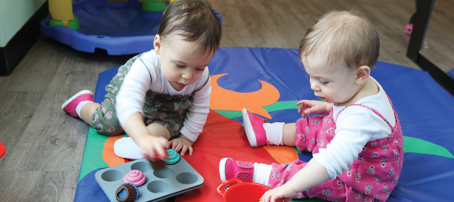 infants playing at Harbroufront Childcare Centre