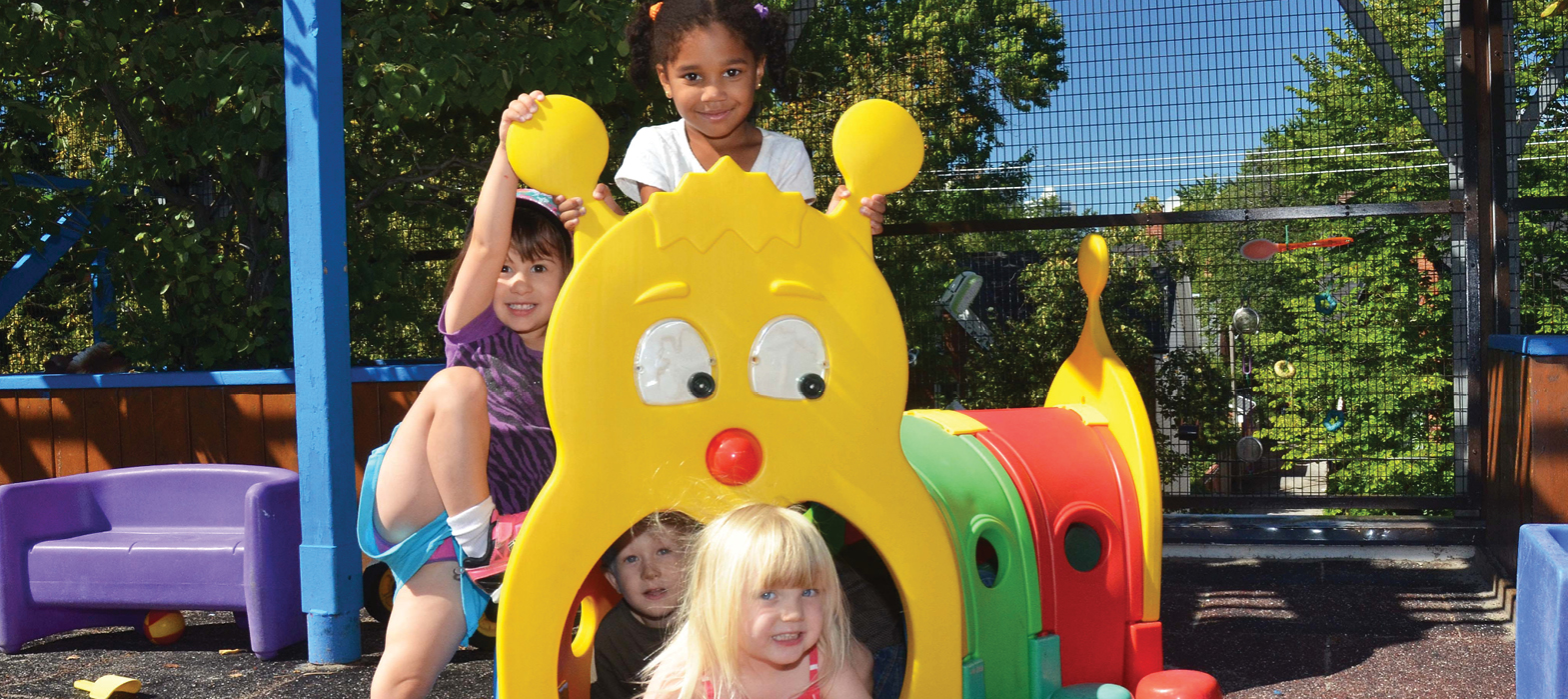 children in the Ontario Street Child Care Centre playground