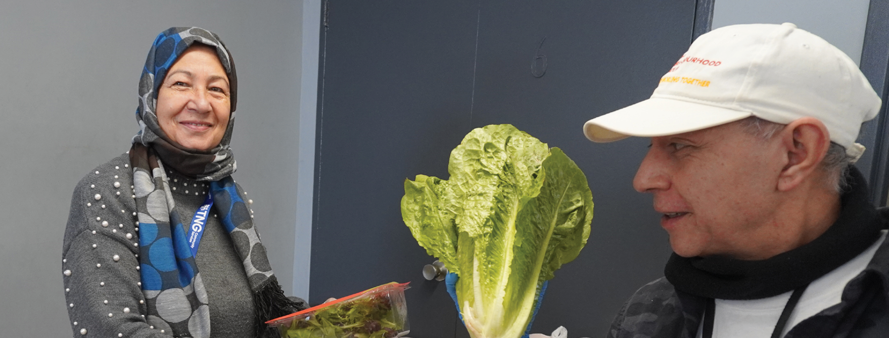 woman and man working in Food Bank